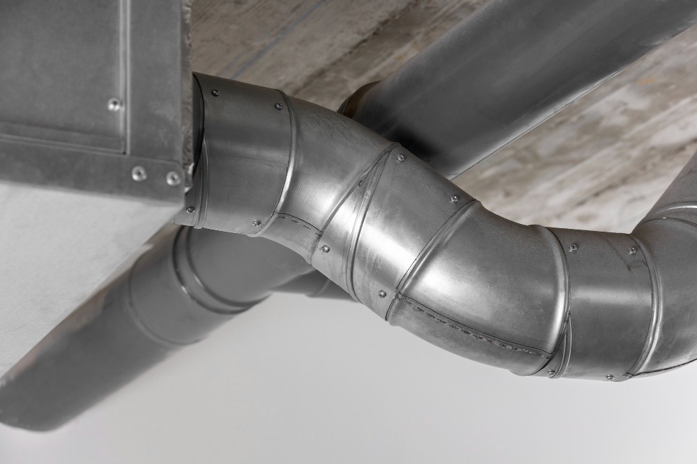 Secure downpipe installation to improve water flow control